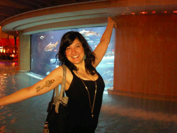 Female model photo shoot of arportia in Shark Tank Water Slide, Golden Nugget, Las Vegas