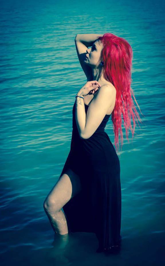 Female model photo shoot of Breanna Famous in Lake Michigan