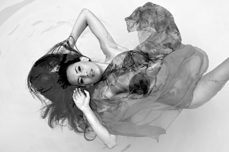Female model photo shoot of shatteringlass