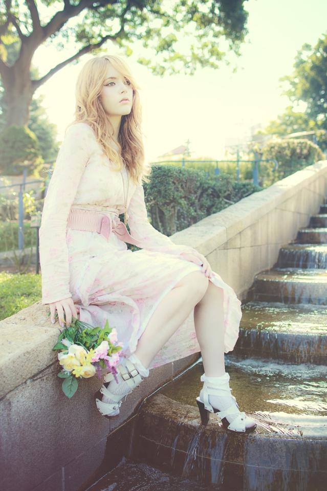 Female model photo shoot of Nishi K in Yokohama Rose Garden