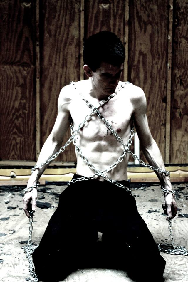 Male model photo shoot of _Chains_