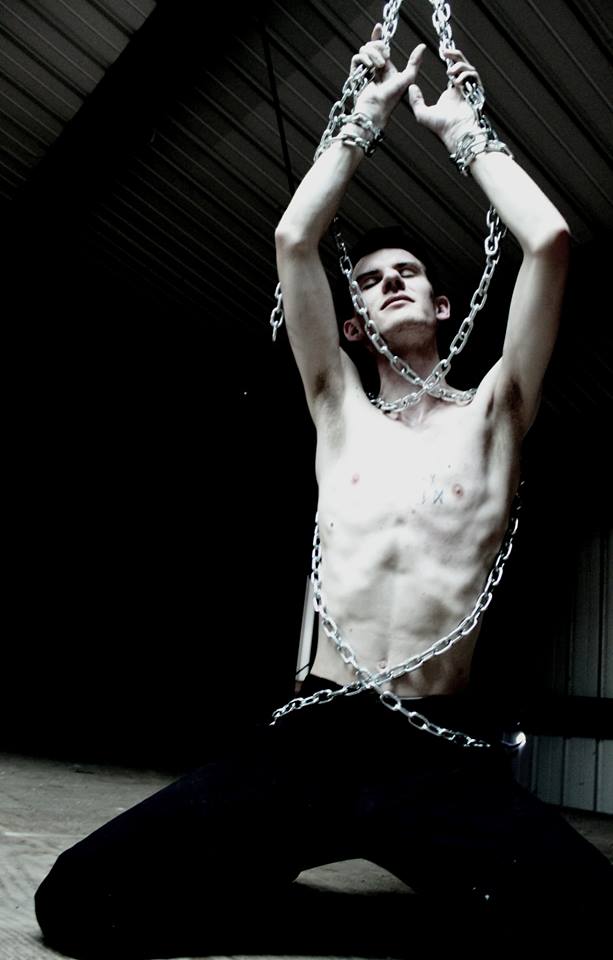 Male model photo shoot of _Chains_