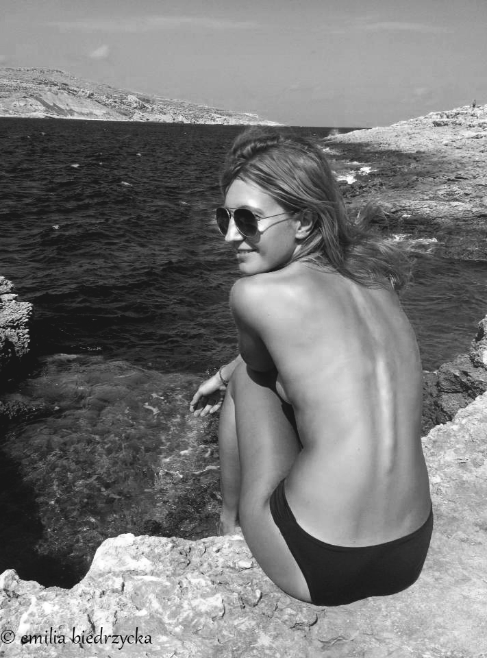 Female model photo shoot of Emilia Biedrzycka in Comino Island, Blue Lagoon