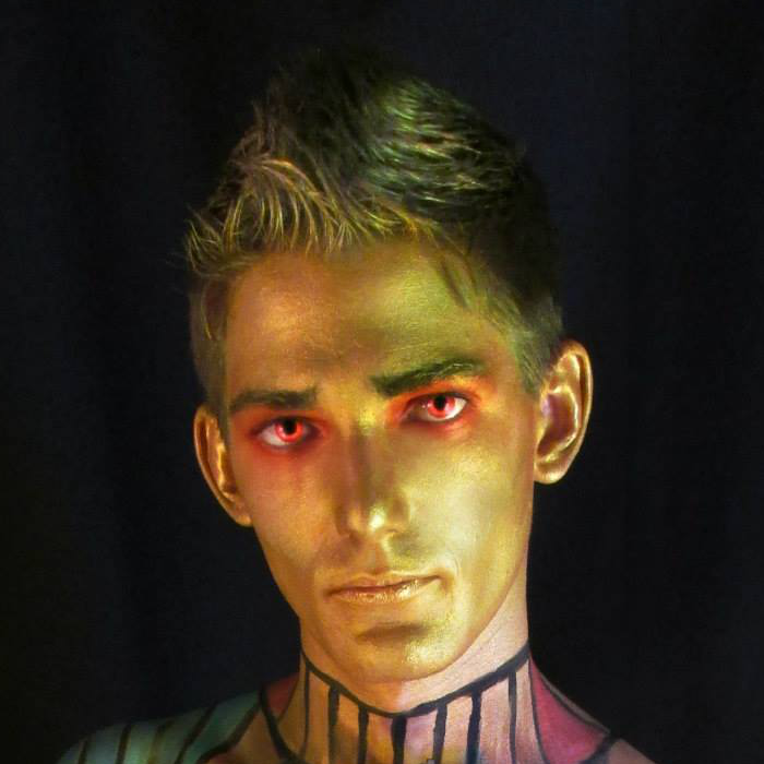 Male model photo shoot of Ty Monzingo, body painted by Art By Brandon McGill