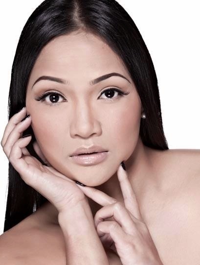Female model photo shoot of Tesha Celebrity Make-up