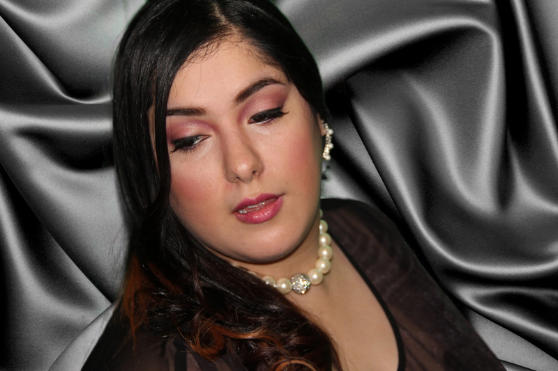Female model photo shoot of Elegance Makeup By Deir