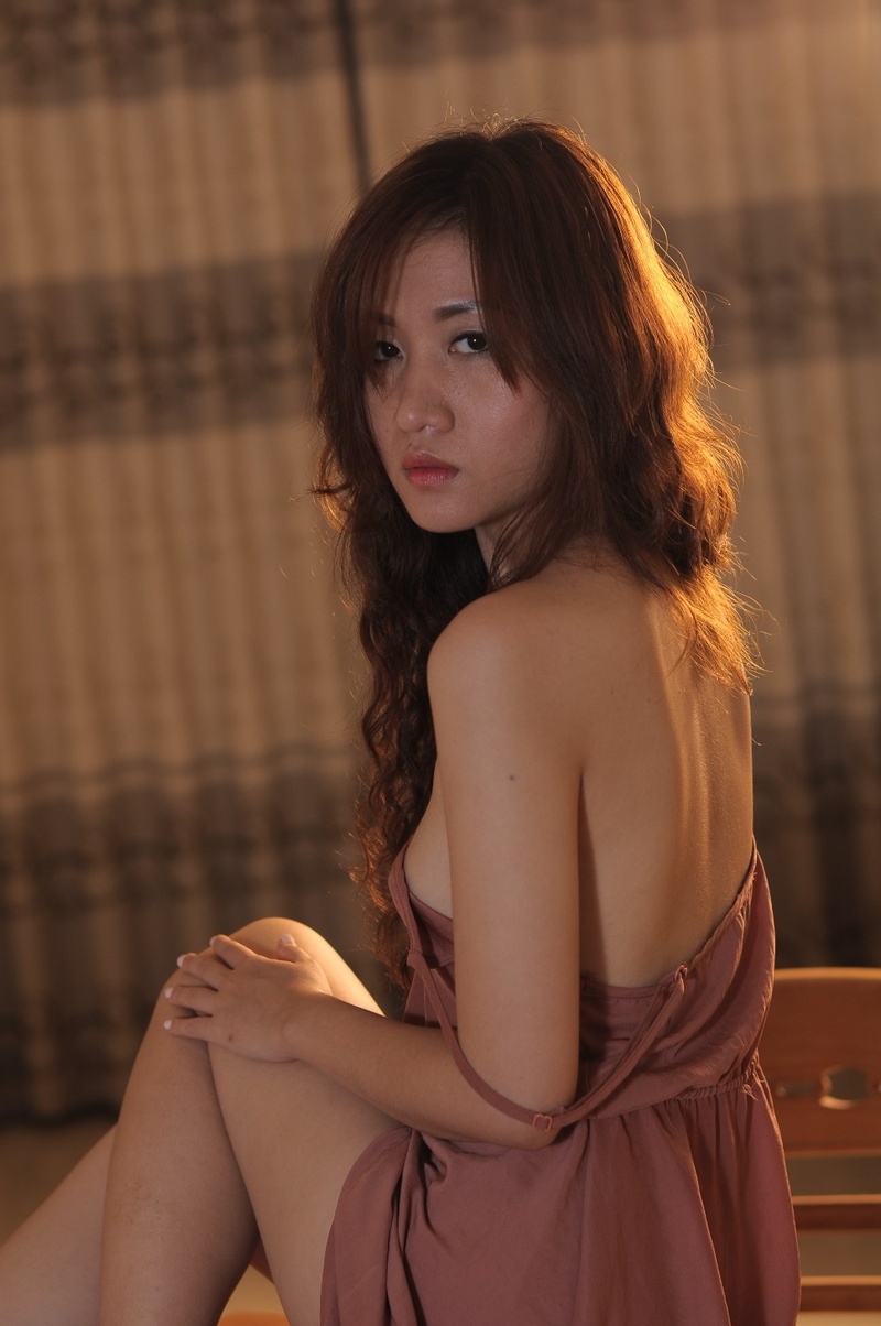 Female model photo shoot of Sexy Asian Model in private studio