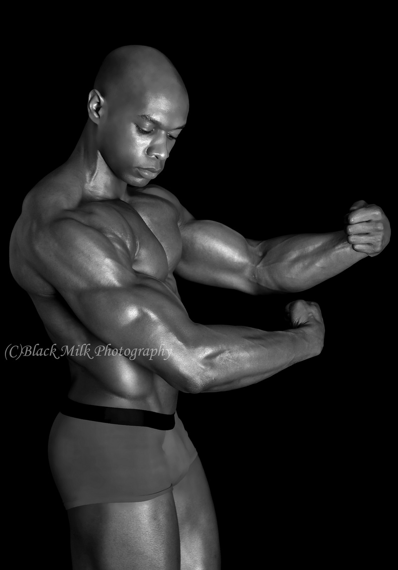 Male model photo shoot of Dorian Cozier by Black Milk Photography