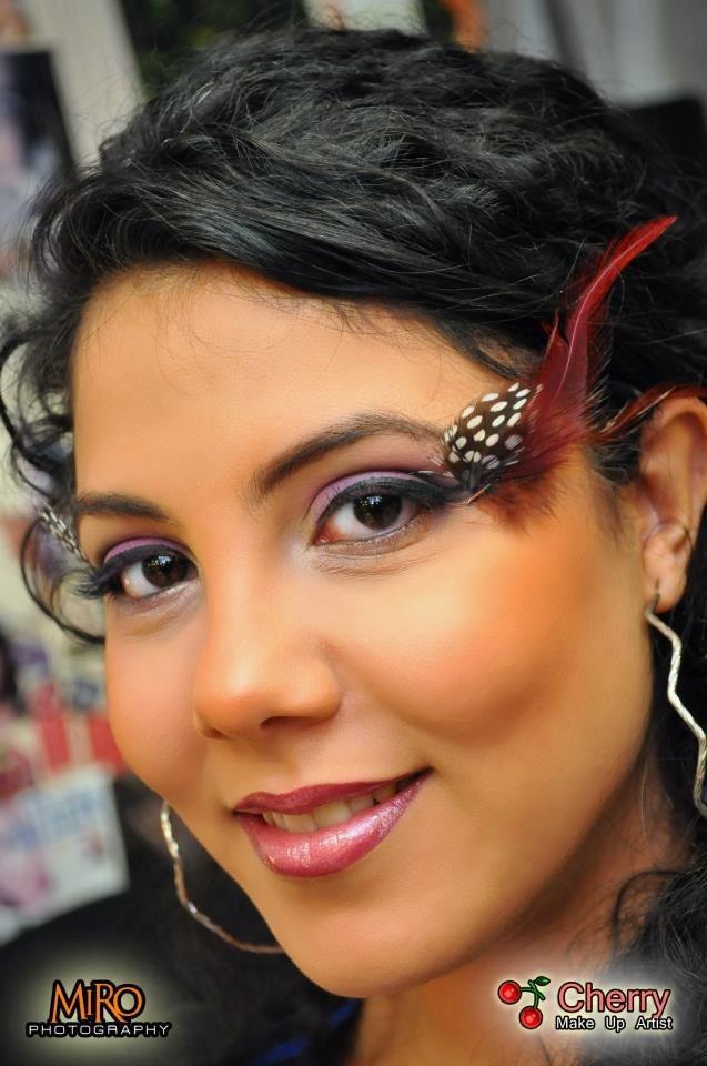 Female model photo shoot of moncherry makeup 