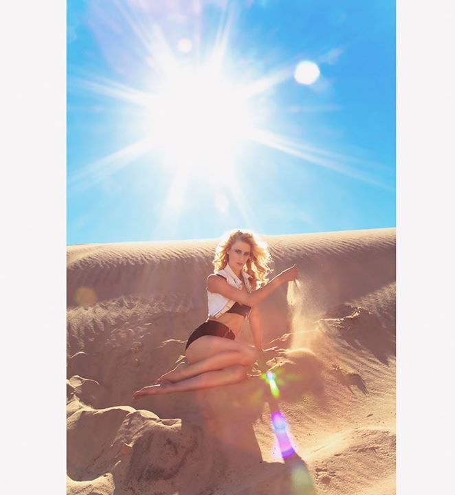 Female model photo shoot of Devon Jaykay in sand dune