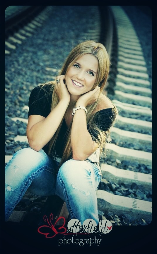 Female model photo shoot of Halle Mikkel in Railroad tracks by Railhead Park in Auburn, CA