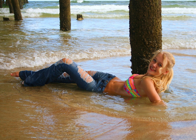Female model photo shoot of Kia Rose Model by SunSplash Photography in Daytona Beach, FL