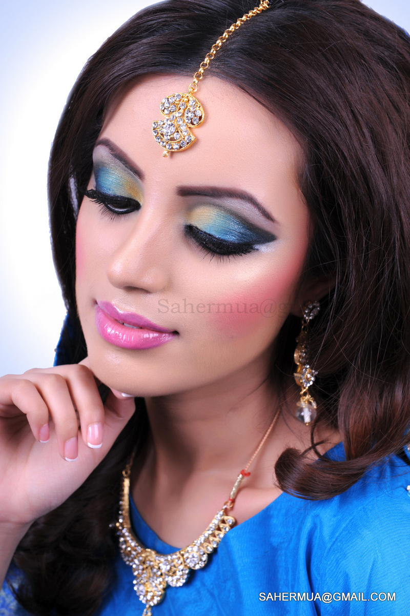 Female model photo shoot of SAHER Hair and Makeup A in London