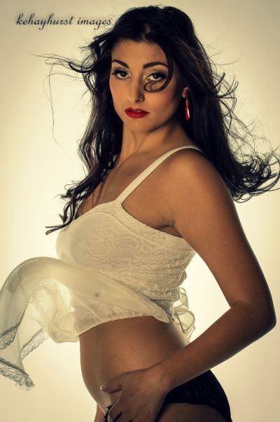 Female model photo shoot of ScarletV by k e hayhurst images, makeup by Ricki Retino MUA