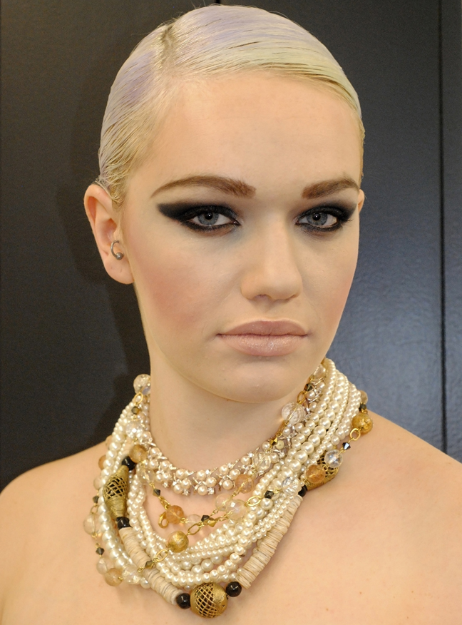 Female model photo shoot of Charlotte Eden Makeup