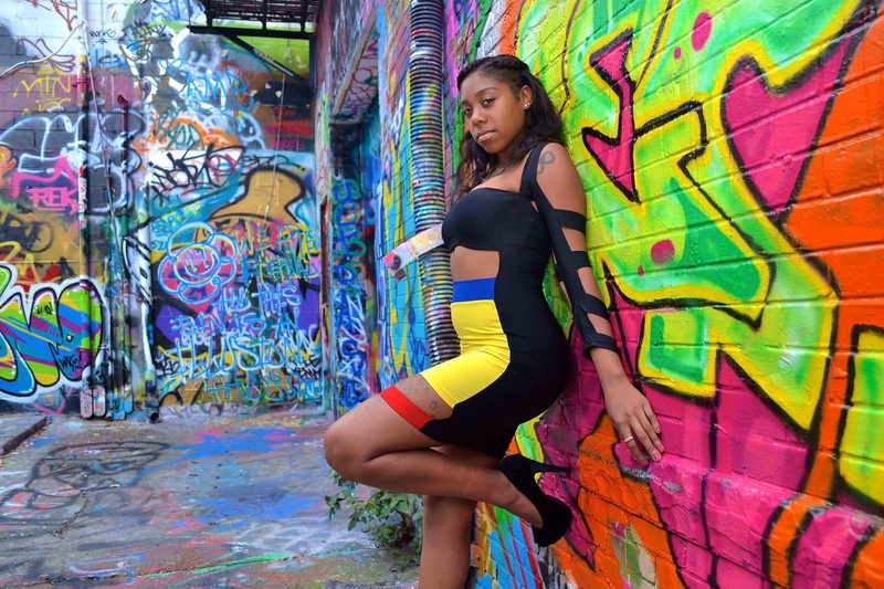 Female model photo shoot of Bellavon Black by Eric Maurice in graffiti warehouse