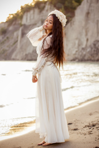 Female model photo shoot of Karen Selina, clothing designed by Fuska Boutique