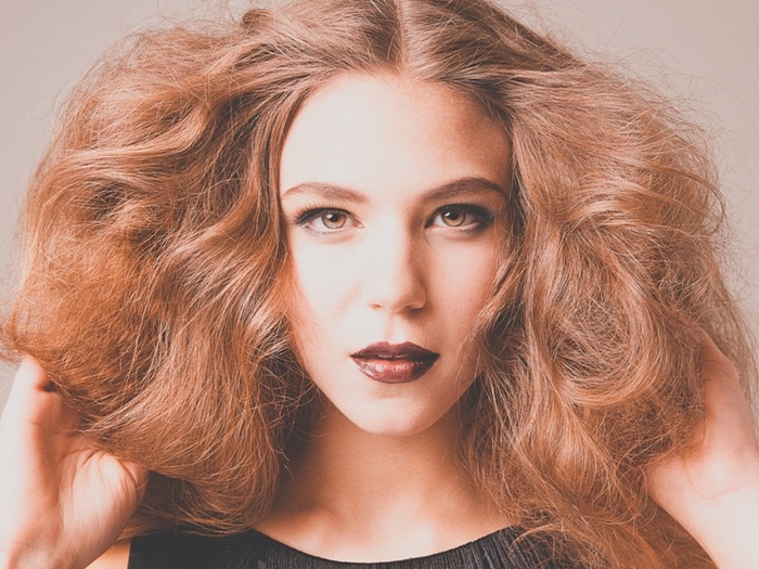 Female model photo shoot of Aura Makeup and Hair
