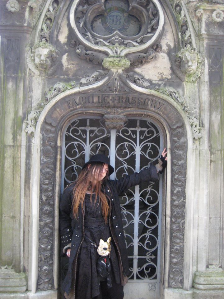 Female model photo shoot of Archaic ghost in Paris graveyard
