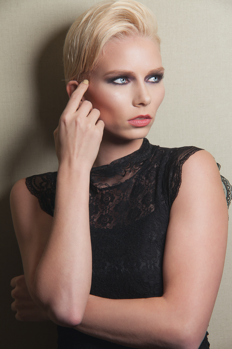Female model photo shoot of Carmen Marie Hair