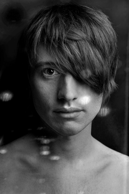 Male model photo shoot of model tom by KAROLINA HELLER in London