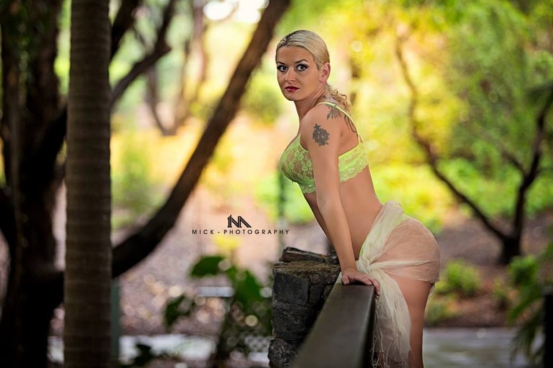 Female model photo shoot of Lani Phoenix by 1M Photography in botanical gardens