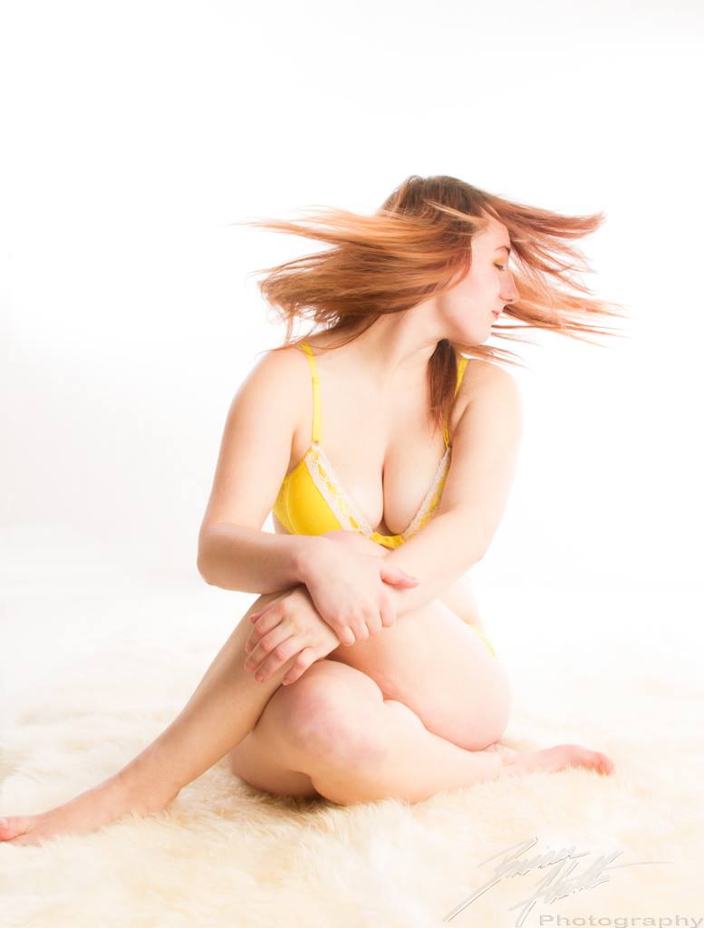 Female model photo shoot of Courtni Reynolds by Brian Huth Photography in Oshkosh