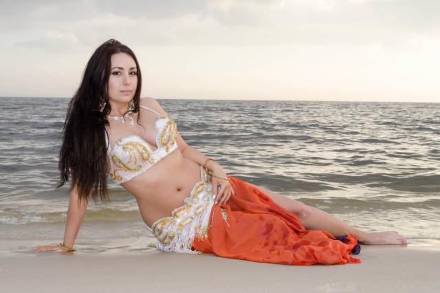 Female model photo shoot of Infinite Spectrum Photo in Ocean Springs