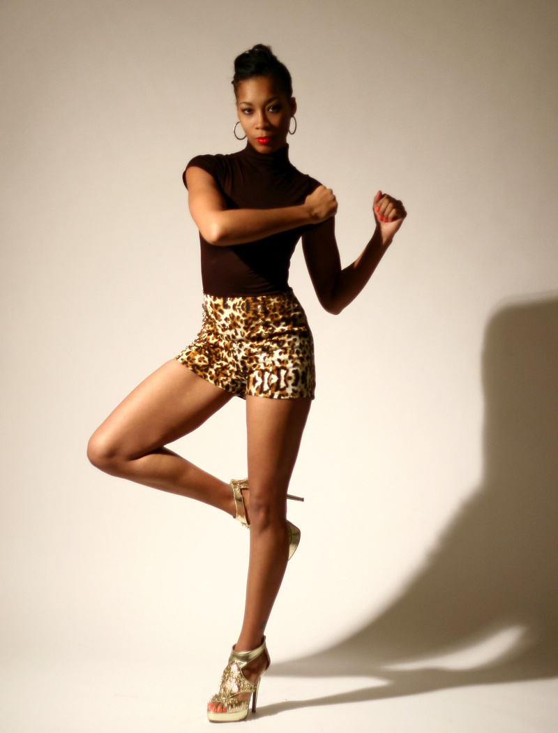 Female model photo shoot of TaiShana Hubbard, art by Okoro Studio