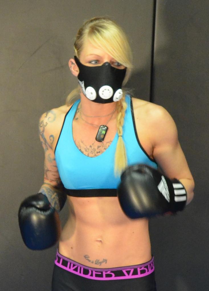 Female model photo shoot of Shannon Razorblade  Pro in Dynasty MMA