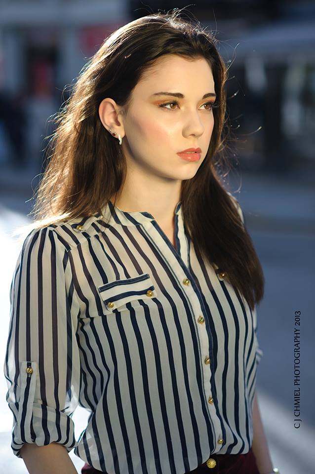 Female model photo shoot of Micki Johns in Sloane Square, London