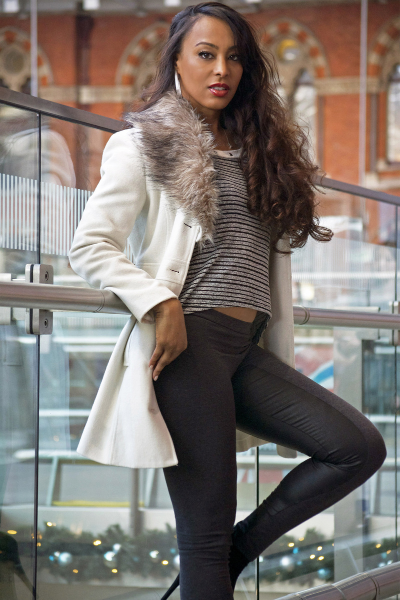Female model photo shoot of Miss  D I A N A in St. Pancras train station in London