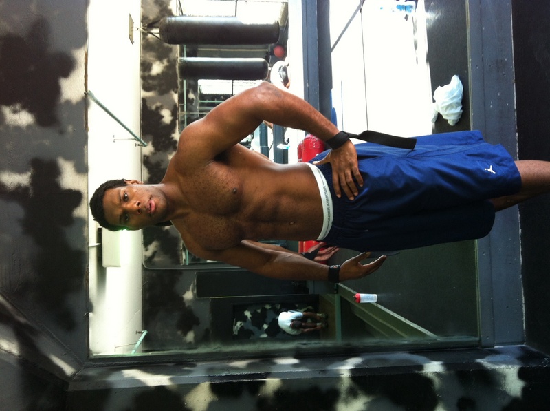 Male model photo shoot of Russell Wooten in Gym