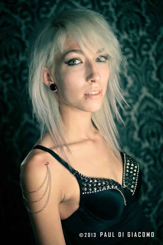 Female model photo shoot of Macdie by Paul Di Giacomo in la suite tattoo shop, quebec city