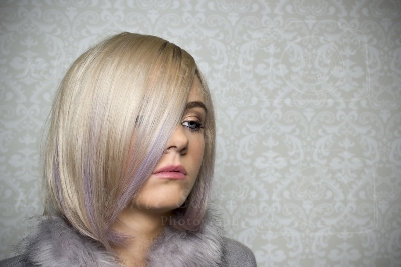 Female model photo shoot of K-M Savill Photography in Rush Hair Salon Ilford