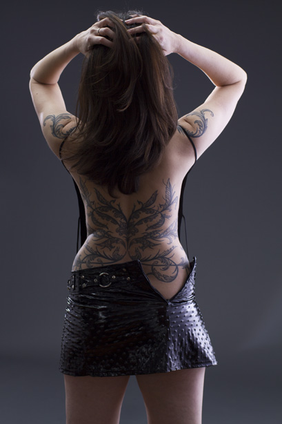 Female model photo shoot of Acanthus Tattoos