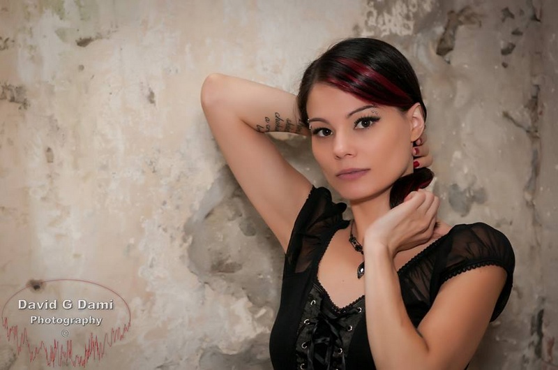 Female model photo shoot of Cristalena Fury in Eastern State Penitentiary 