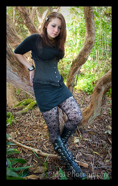 Female model photo shoot of Aneleise  in Woods