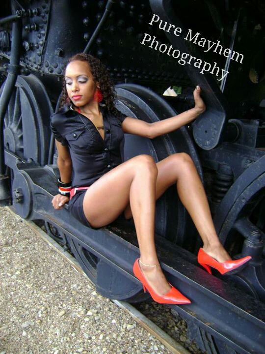 Female model photo shoot of Pure Mayhem Photography