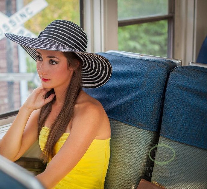 Female model photo shoot of Vanessa Penick in Train Station