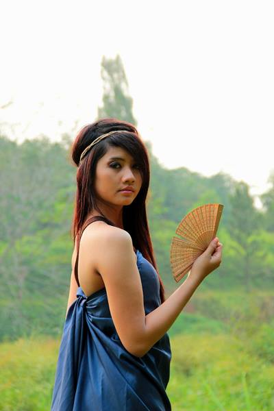 Female model photo shoot of DIAN INDRIANI