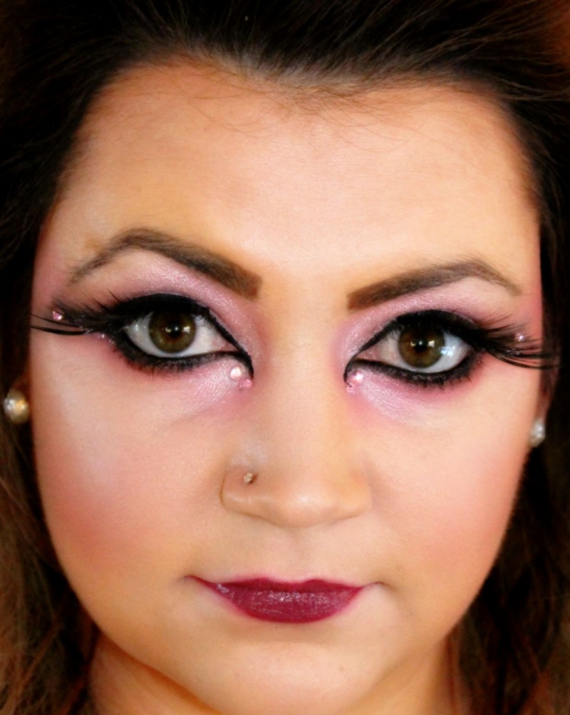 Female model photo shoot of Her Makeup