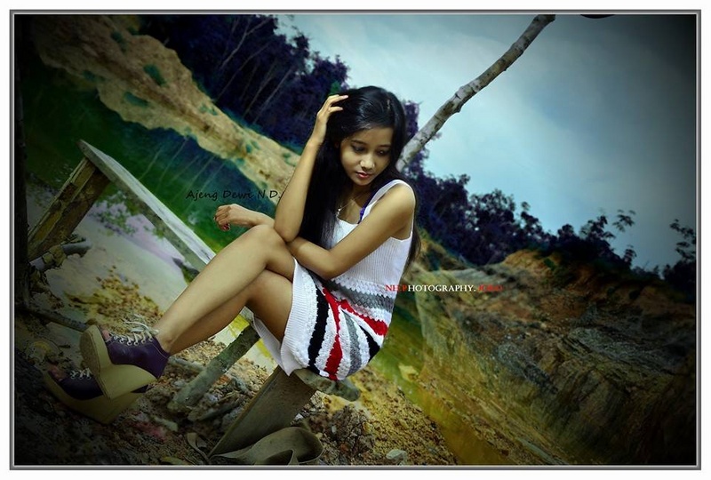 Female model photo shoot of Ajeng Dewi Nellendia D in Dark Lake