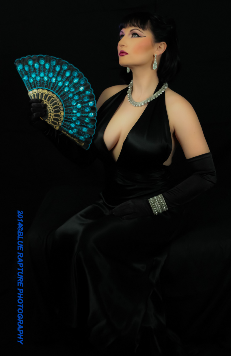Female model photo shoot of BlueRapturePhotography in Blue Rapture Photography, makeup by Kafiah Winston