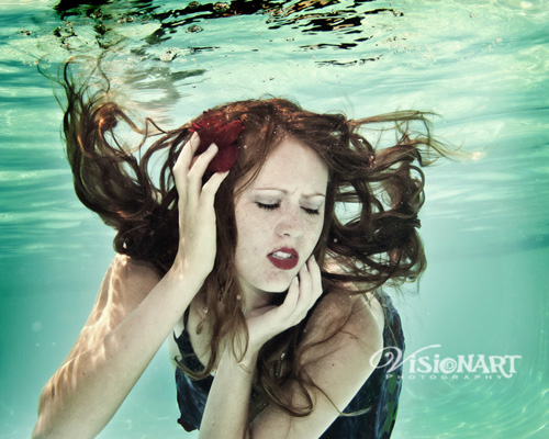 Female model photo shoot of Visionart Photography in underwater in Colorado Springs