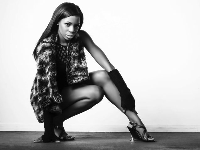 Female model photo shoot of Syri, clothing designed by Maddox Leather Design