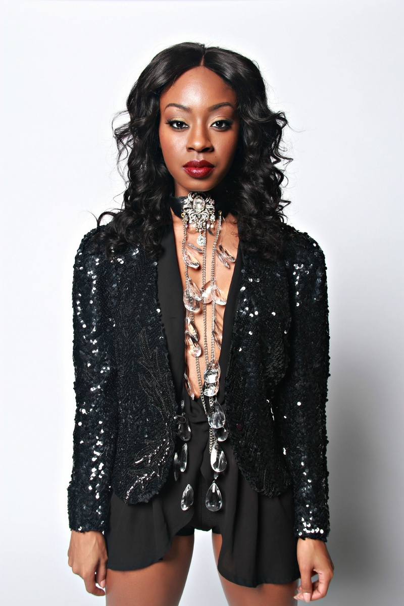 Female model photo shoot of UnChained Culture by Dontez Akins in Studio 668