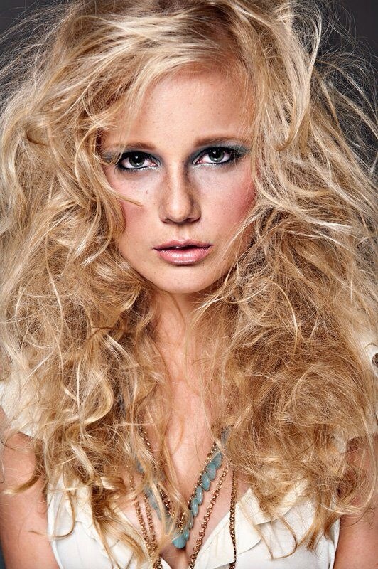 Female model photo shoot of Intertwine Hair Design