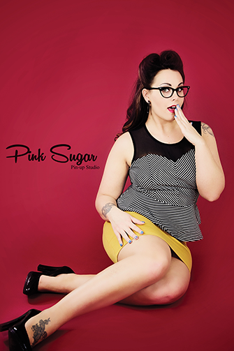 Female model photo shoot of Pink Sugar Pinup Studio
