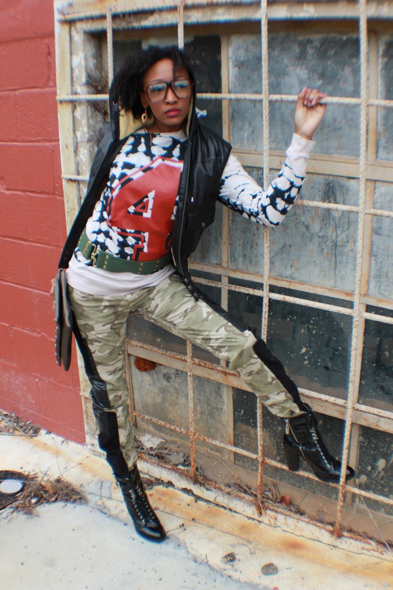 Female model photo shoot of TaShanna in Designer Cosigns Boutique- Atlanta  Owner: Stephanie Flowers
